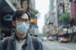 © alisaaa - Gentleman with in coronavirus infected city wearing a pollution mask One man, young Taiwanese businessman downtown in Taipei, wearing a pollution mask