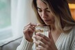 © alisaaa - Woman taking medicine and holding a glass of water in hand, Because there is an illness