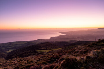 Wall Mural - Beautiful sunset over the South Coast of Sao Miguel island in the Azores. Golden hour landscape of Sao Miguel island.