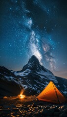 Wall Mural - a tent is set up in front of a mountain under a night sky filled with