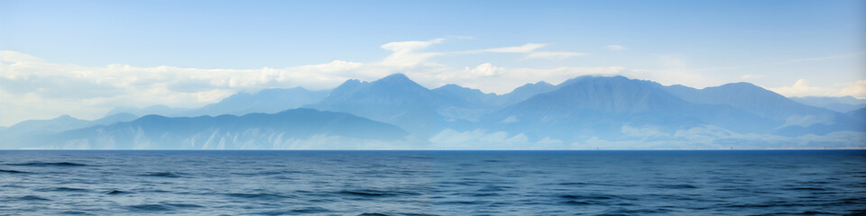 Wall Mural - The ocean is calm and the sky is clear