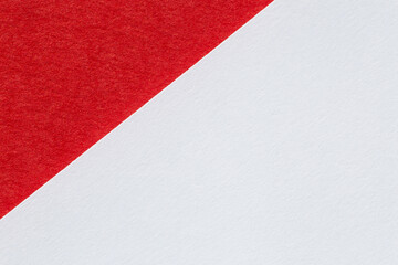 close up of red cardboard and white paper textures