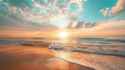 Wall Mural - Beautiful dawn at the beach with a glowing sunrise and scattered clouds, ideal for serene nature photos.