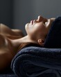 ©  Green Creator - Close-up of a woman's face while lying down and relaxing.