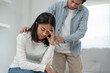 © Shisu_ka - Couple support each while discussing family issues with psychiatrist. Husband encourages and empathy wife suffers depression. psychological, save divorce, Hand in hand together, trust, care
