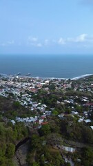 Wall Mural - La Libertad beach town in El Salvador aerial view of surrounding neighborhoods and town.