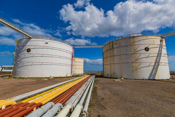 Poster - View of the new installation crude oil storage tank in the tank farm. storage tanks can be used to hold materials such