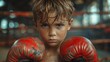 © Dmitry - A young boxer, in a throwback scene, looks sure into the camera, boxing gloves on, his will communicated clearly in his stare.