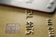 © New Africa - Two plastic credit cards as background, macro view