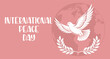 © Tatiana - International peace day. Silhouette of a white dove against a background with a globe. Illustration. Vector