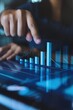 © cff999 - a person is using a computer with a bar graph on it