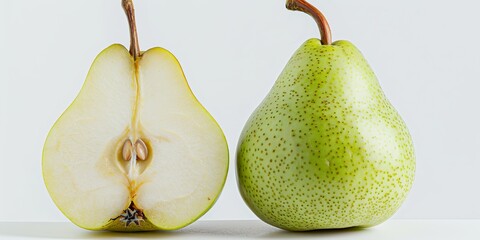 Wall Mural - Whole and cut green pear on white background.