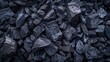 © pitu - Dark texture of black color.The surface of natural black hard coal. Best grade of metallurgical anthracite coals. Black background.