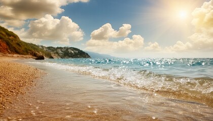 Wall Mural - summer sea with sparkling waves and blue sunny sky