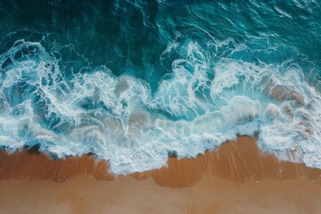 Wall Mural - Aerial View of Ocean Waves Crashing on Beach