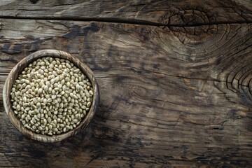 Sticker - Top view of bowl with organic blanched hemp seeds on old wooden table Healthy eating supplement Superfood concept