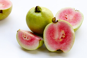 Wall Mural - Fresh pink guava on white background.