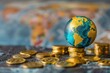 © darshika - Moneys global influence depicted with gold coins and globe.