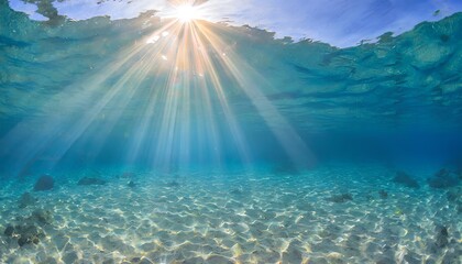 The sun is shining brightly on the ocean's surface, creating a beautiful