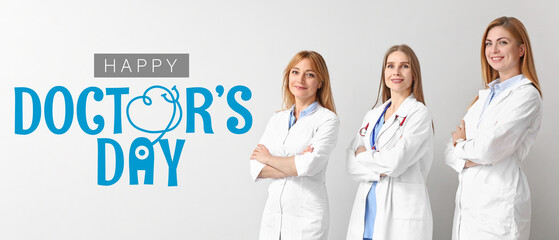 Poster - Portrait of female doctors on light background