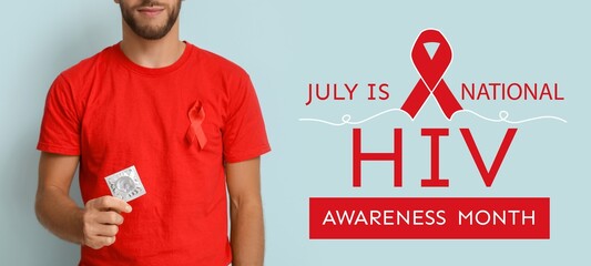 Wall Mural - Banner for National HIV Awareness Month with young man with red awareness ribbon and condom