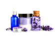 © Pixel-Shot - Set of cosmetic products, candle and lavender flowers on white background