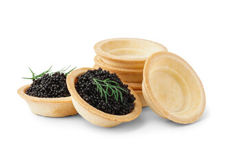 Wall Mural - Tasty tartlets with black caviar on white background