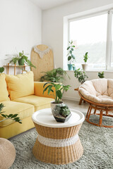 Wall Mural - Interior of living room with plants, table and sofa