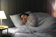 © Pixel-Shot - Beautiful young woman sleeping in bedroom at night