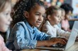 © InfiniteStudio - Multiethnic group of children using computers in a classroom.
