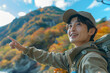 © oyo - 紅葉の山でハイキング・登山をする若いアジア人男性のポートレート