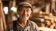 © Naknakhone - Portrait of carpenter handsome man smiling at factory. copy space for text.