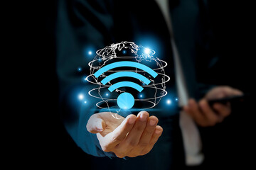Wall Mural - use business smartphone with wifi icon, business communication social network concept.