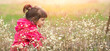 © vvvita - Happy little girl in a flower meadow on a sunny day