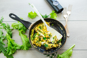 Wall Mural - fried omelette stuffed with herbs, parsley, dill