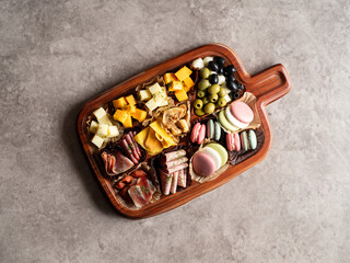 Wall Mural - Raw ham, olives and cheese on a plate	