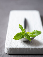 Canvas Print - Fresh mint leaves on plate