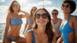 © KraPhoto - Group of Friends Enjoying a Sunny Day on a Boat Wearing Swimwear and Sunglasses