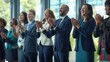 © Studio Nova - The business team applauding