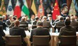 © Nadin Faust - world leaders at g20 meeting discussing corporate presentations with flags in background