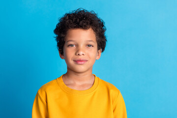 Poster - Photo of nice little schoolboy empty space wear pullover isolated on blue color background