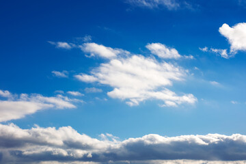 Wall Mural - clouds on a blue sky. meteorology nature background. weather change before the rain
