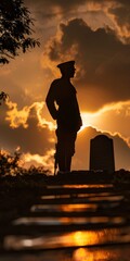 Wall Mural - Dramatic silhouette of a soldier standing guard at a tomb.