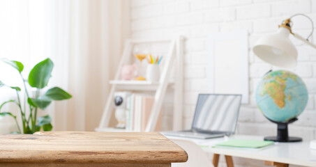 Wall Mural - vintage wooden desk table top for product display in defocused education room