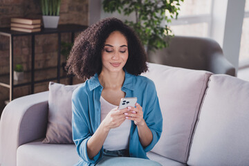 Sticker - Photo of pretty charming adorable successful woman relax rest read news hold phone in cozy room indoors