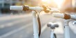 © Anastasiia - Electric Bikes and Scooters Promote Environmental Conservation. Concept Sustainable Transportation, Urban Mobility, Clean Energy, Eco-Friendly Commuting