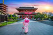 © tawatchai1990 - Asian woman wearing japanese traditional kimono at Temple in Tokyo, Japan.
