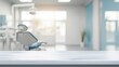 © Schmidt - a close up of a empty table with white dental clinic room background