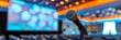 © Elmira - Close-up of a microphone in front of a screen, ready for a presentation in a conference room. Blurred background hints at an upcoming event