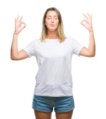 Poster - Young beautiful woman over isolated background relax and smiling with eyes closed doing meditation gesture with fingers. Yoga concept.